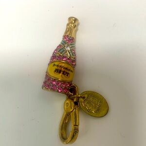 Juicy couture champagne bottle charm.  2012 limited edition. Gold & pink tones.